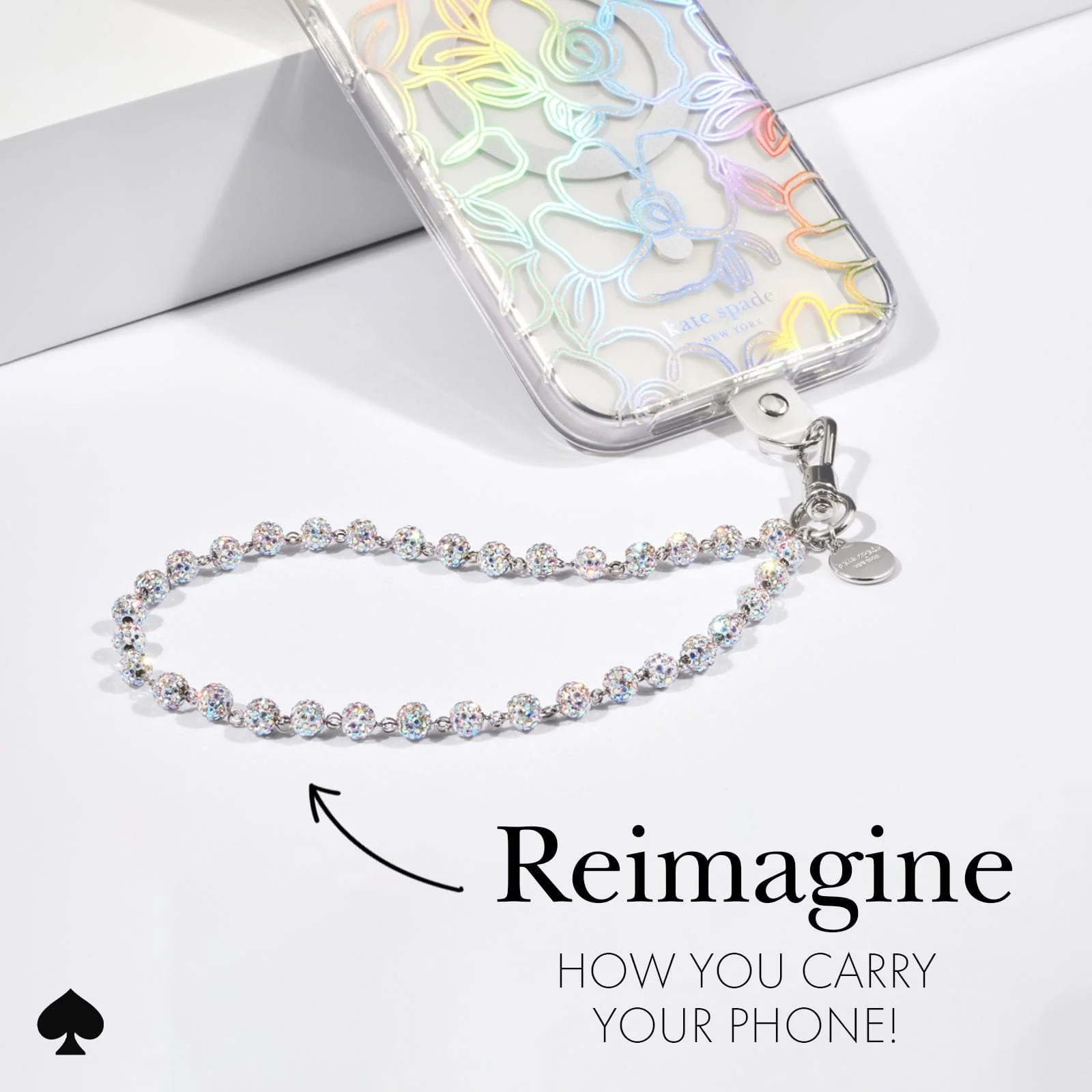 Kate Spade New York รุ่น Phone Charm - สายคล้องข้อมือ - ลาย Razzle Dazzle 23 Kate Spade New York รุ่น Phone Charm - สายคล้องข้อมือ - ลาย Razzle Dazzle